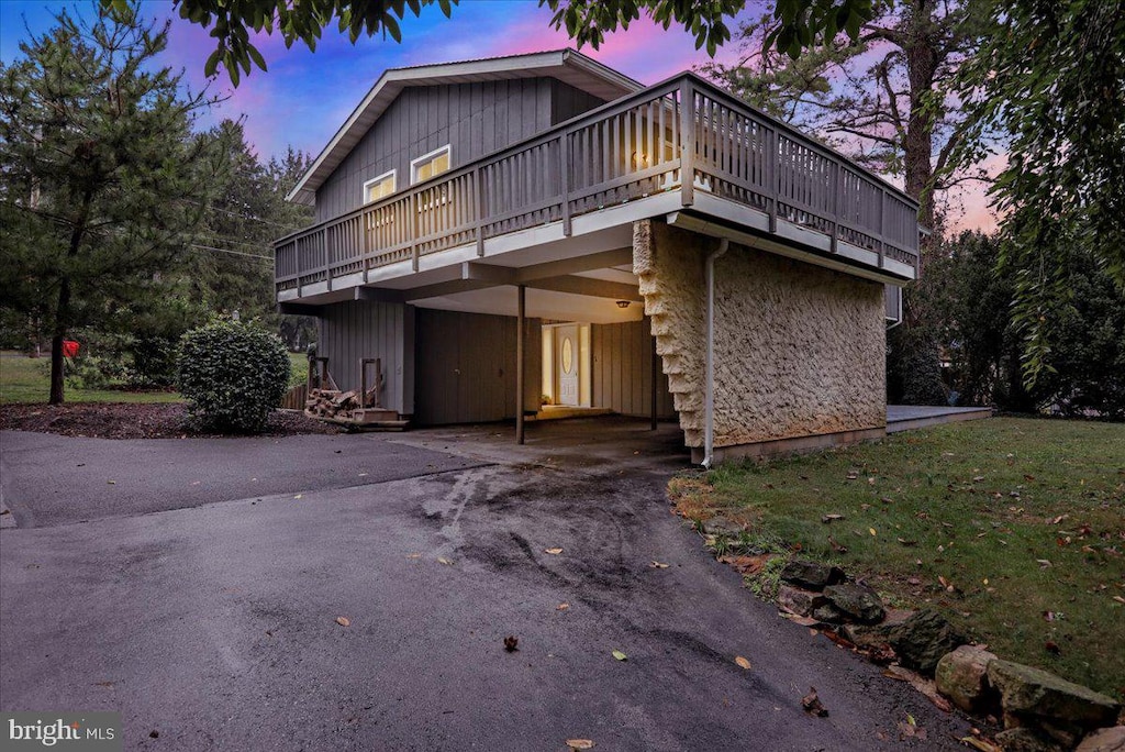 front of property featuring a deck