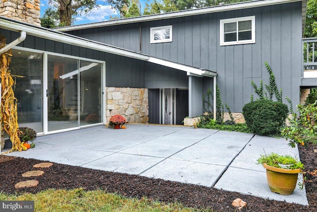 back of house with a patio area