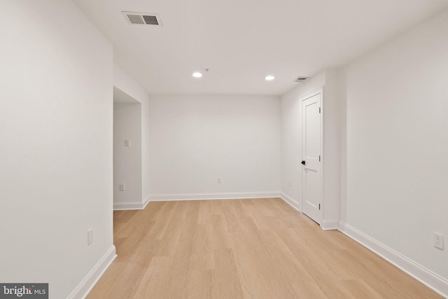 unfurnished room with light hardwood / wood-style flooring