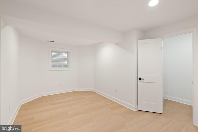 spare room featuring light hardwood / wood-style flooring