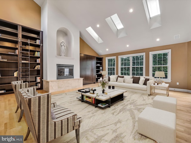 52 Violets Path, Elizabethtown, PA 17022 - living room with a skylight, high vaulted ceiling, wood finished floors, a premium fireplace, and recessed lighting