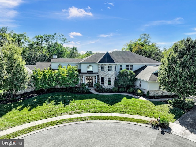 view of front of home with a front yard