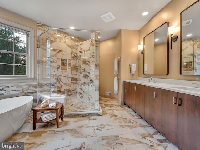 52 Violets Path, Elizabethtown, PA 17022 - bathroom featuring double vanity, a freestanding bath, a marble finish shower, marble finish flooring, and recessed lighting