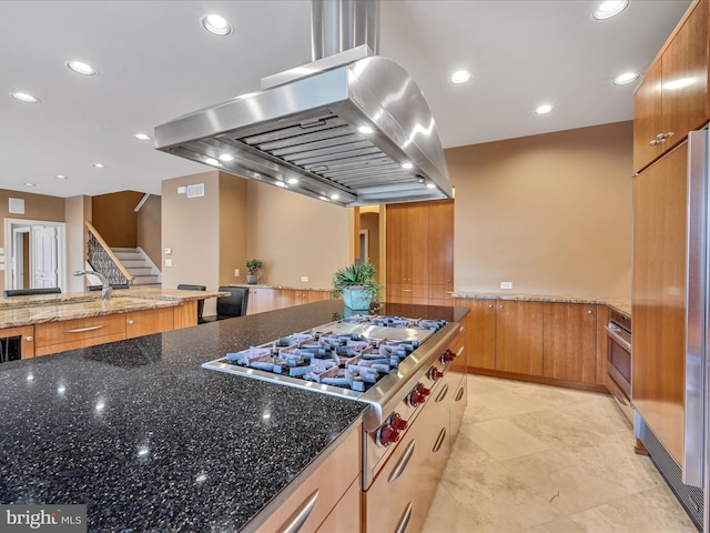 52 Violets Path, Elizabethtown, PA 17022 - kitchen featuring appliances with stainless steel finishes, extractor fan, dark stone counters, recessed lighting, and brown cabinets
