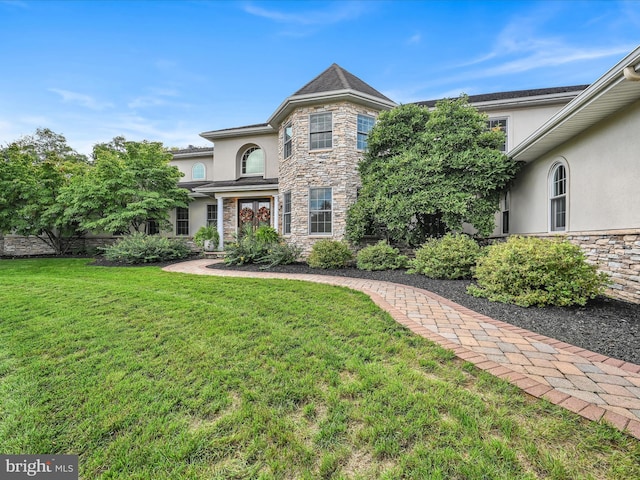 52 Violets Path, Elizabethtown, PA 17022 - view of front of house with stucco siding, stone siding, and a front lawn
