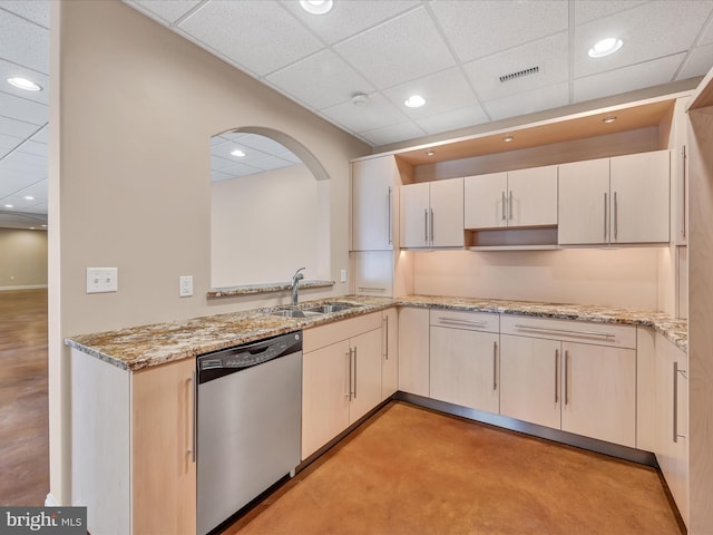52 Violets Path, Elizabethtown, PA 17022 - kitchen featuring stainless steel dishwasher, a sink, a drop ceiling, arched walkways, and light stone countertops