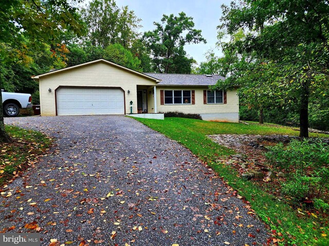 ranch-style home with a garage