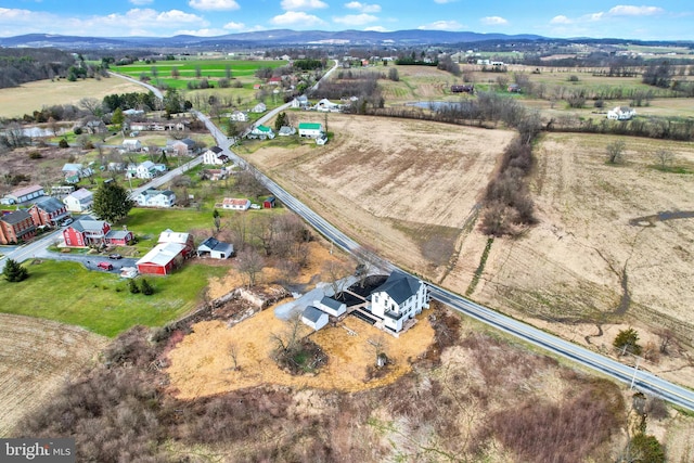 bird's eye view with a rural view and a mountain view