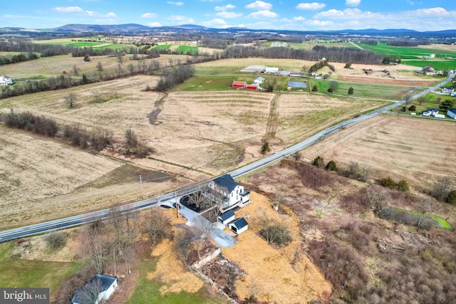 aerial view featuring a mountain view and a rural view