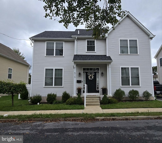 view of front of home with a front yard