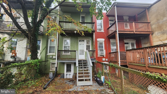 rear view of house with a balcony