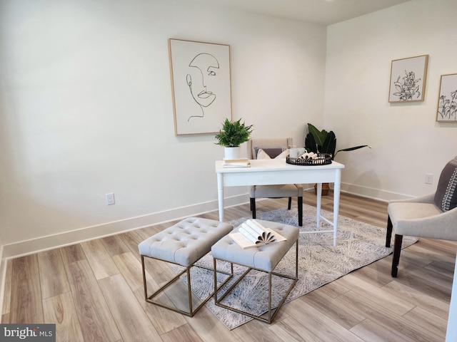 office space with hardwood / wood-style floors