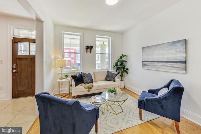 living room with light hardwood / wood-style floors