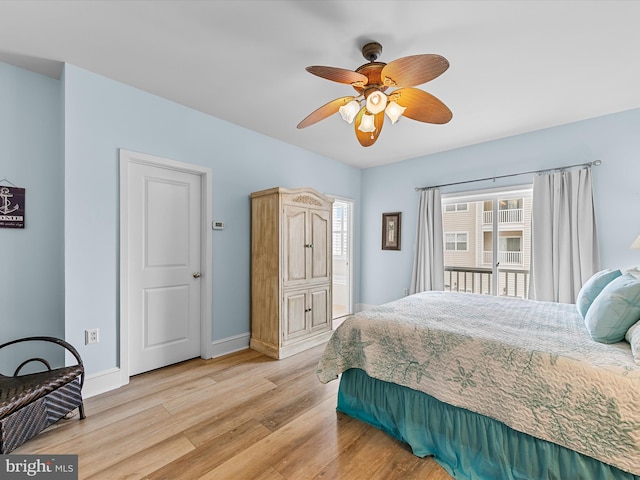 bedroom featuring light hardwood / wood-style flooring and ceiling fan