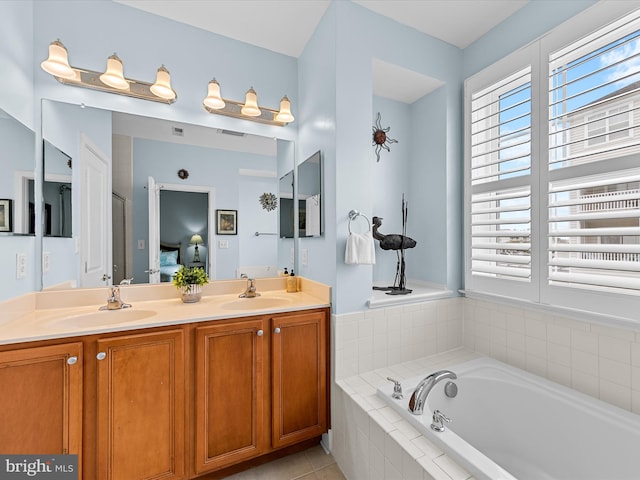 bathroom with vanity, shower with separate bathtub, and tile patterned flooring