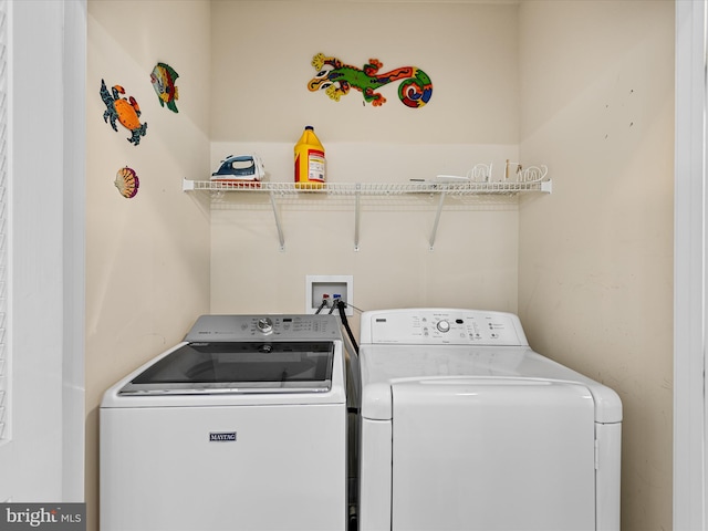 washroom with washing machine and dryer