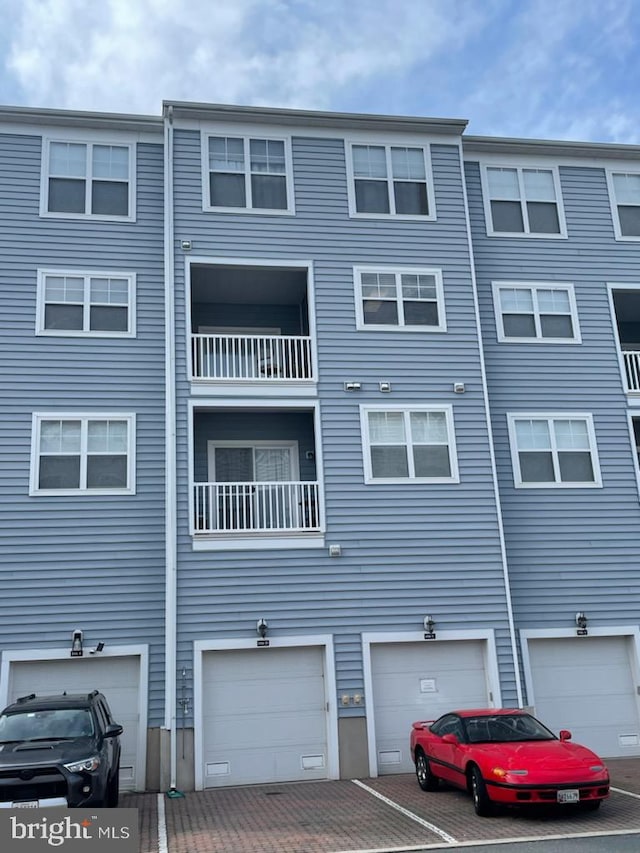 view of building exterior featuring a garage