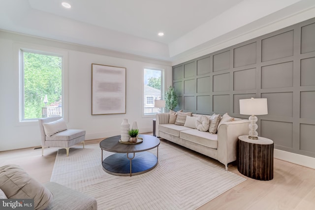 living room with a healthy amount of sunlight and light wood-type flooring