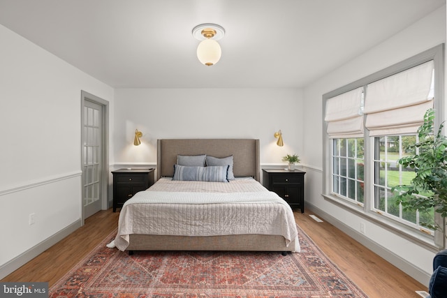 bedroom featuring hardwood / wood-style floors