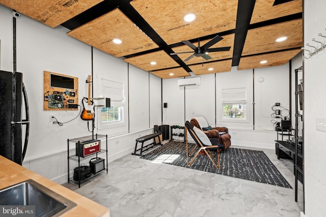 interior space with coffered ceiling, an AC wall unit, ceiling fan, and a wealth of natural light