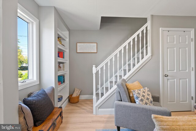 sitting room featuring light wood-type flooring