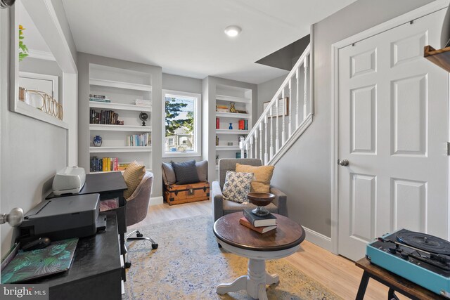 office area with light hardwood / wood-style flooring