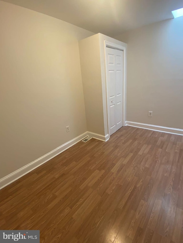 interior space with dark wood-type flooring