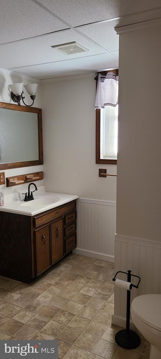 bathroom with vanity and toilet