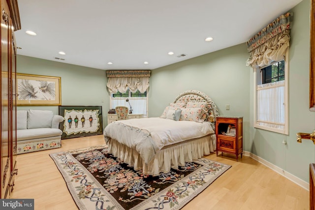 bedroom featuring light wood-type flooring