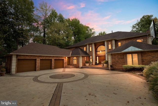 prairie-style home featuring a garage