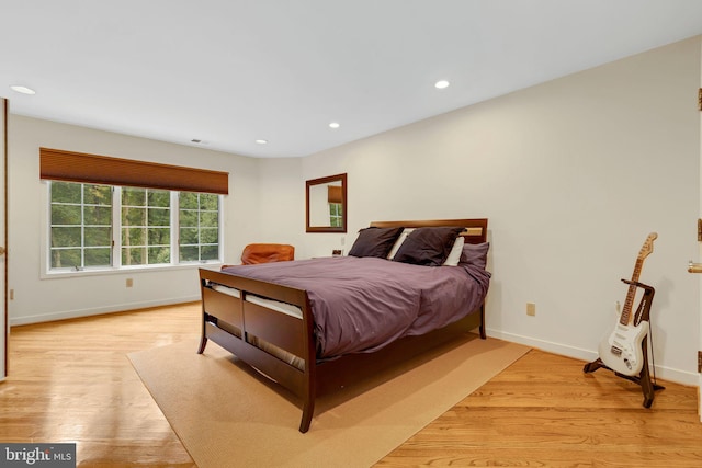 bedroom featuring light wood-type flooring