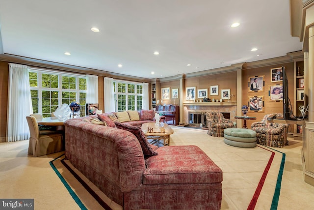 carpeted living room featuring ornamental molding