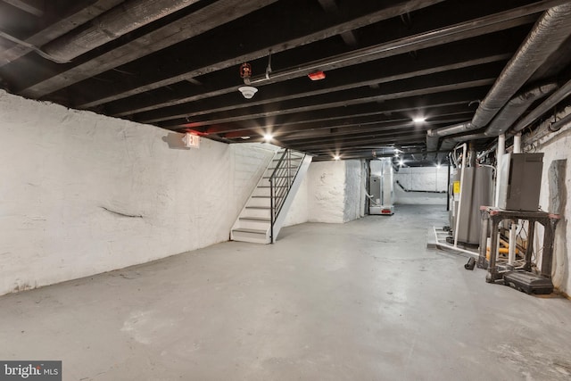 basement with gas water heater and heating unit