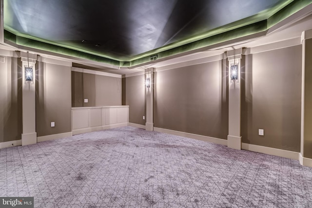 home theater featuring a tray ceiling