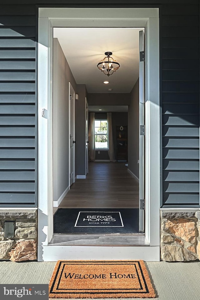 property entrance featuring covered porch