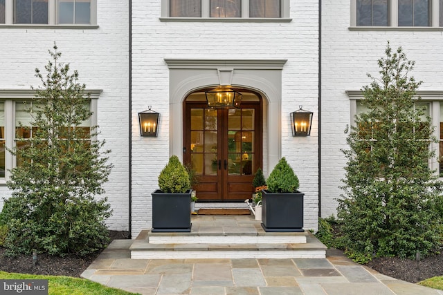 property entrance featuring french doors