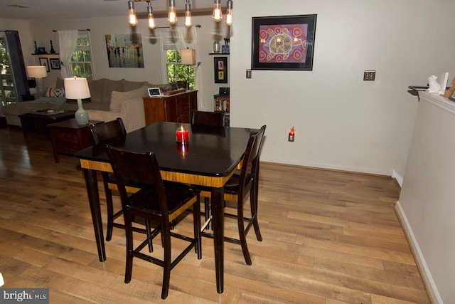 dining room featuring light hardwood / wood-style floors