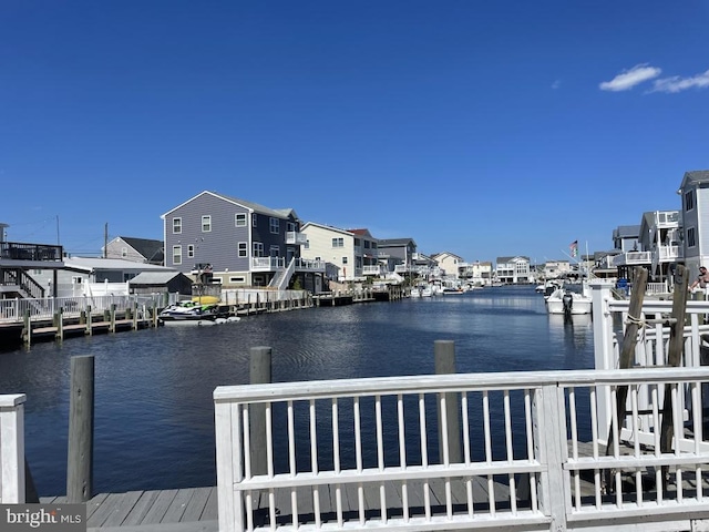 dock area with a water view