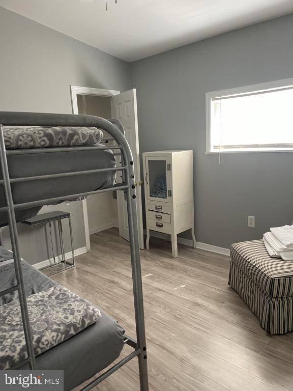 bedroom featuring light hardwood / wood-style floors