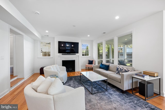 1307 Cleveland St, Alexandria, VA 22302 - living room with a fireplace, wood finished floors, and recessed lighting