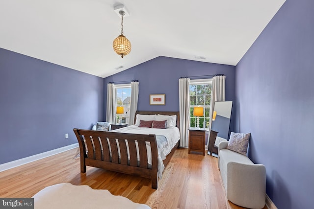 1307 Cleveland St, Alexandria, VA 22302 - bedroom with vaulted ceiling and wood finished floors