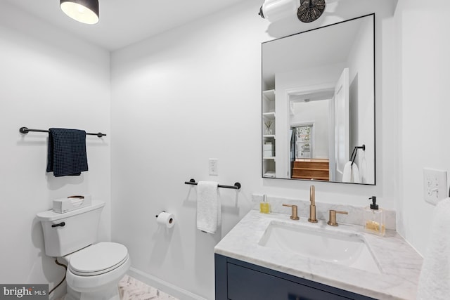1307 Cleveland St, Alexandria, VA 22302 - half bathroom featuring toilet and vanity