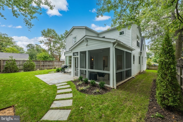 1307 Cleveland St, Alexandria, VA 22302 - back of house with a sunroom, a patio, and a fenced backyard