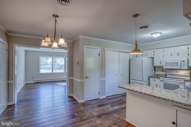 kitchen with pendant lighting, dark hardwood / wood-style floors, white appliances, and white cabinetry