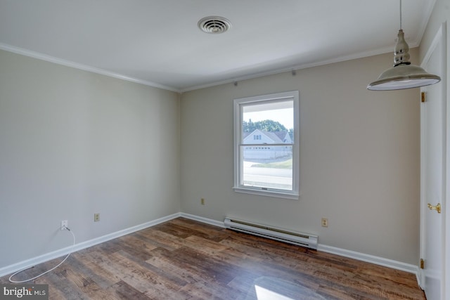 unfurnished room with crown molding, a baseboard heating unit, and dark hardwood / wood-style flooring