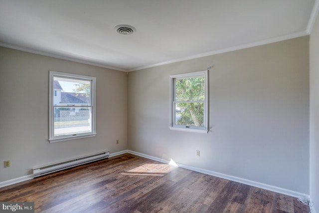 empty room featuring dark wood-type flooring, ornamental molding, a wealth of natural light, and a baseboard radiator