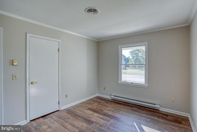 unfurnished room featuring crown molding, hardwood / wood-style flooring, and a baseboard radiator