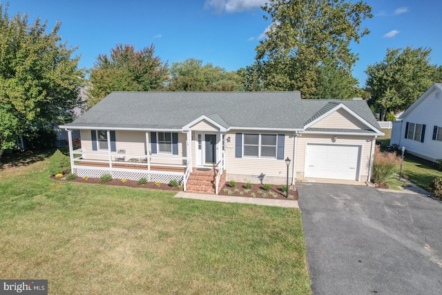 single story home with a front lawn, covered porch, and a garage