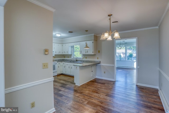 kitchen with white cabinets, sink, dark hardwood / wood-style flooring, kitchen peninsula, and a baseboard radiator