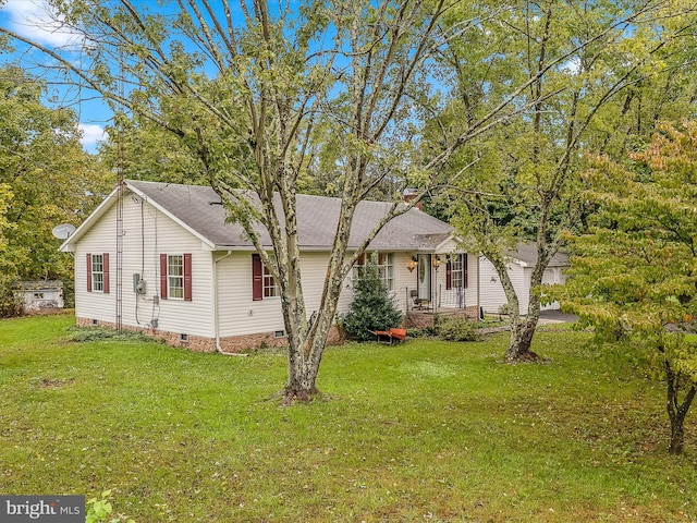 ranch-style home with a front yard